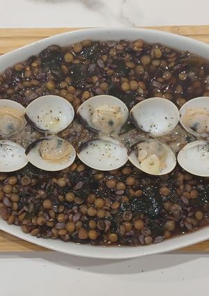 Una foto de Sopa fría de Lentejas con Arroz y Almejas