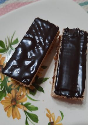 Una foto de Obleas rellenas con baño de chocolate