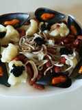 Coliflor con judías y marisco