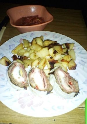 Una foto de Pan de carne relleno con papas al horno