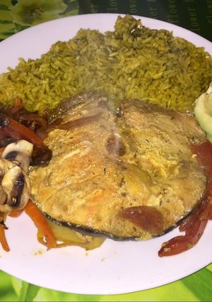 Una foto de Bagre guisado con verduras y champiñones