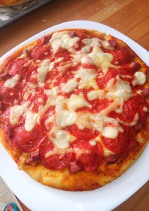 Una foto de Pizza a mi estilo