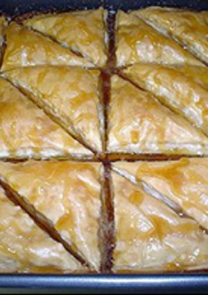 A picture of Baklava (in a large baking pan).