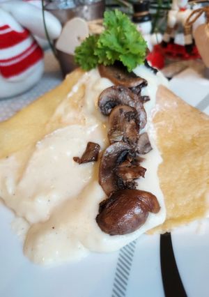 Une photo de Crêpes salées Champignons ricotta et mozzarella