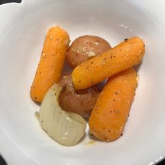 Roasted Potatoes 🥔 and Baby Carrots 🥕with Lemon 🍋 A picture of Roasted Potatoes 🥔 and Baby Carrots 🥕with Lemon 🍋.
