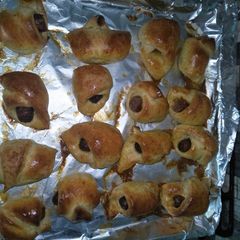 A picture of Pigs in a blanket.