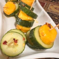A picture of Mango-cucumber kabobs.