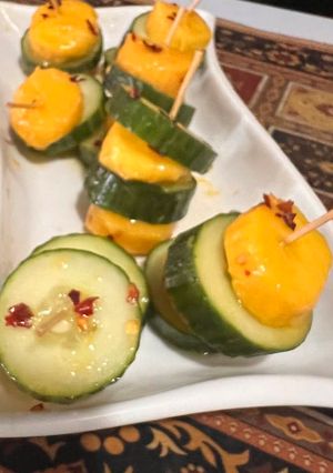 A picture of Mango-cucumber kabobs.