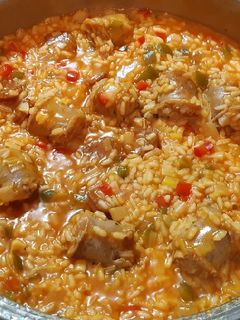 Una foto de Arroz meloso con butifarras y chorizo