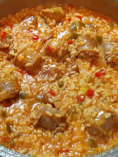 Una foto de Arroz meloso con butifarras y chorizo