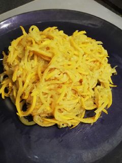 Une photo de Spaghetti de courgettes jaune au curry