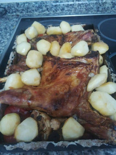 Una foto de Cordero lechal asado