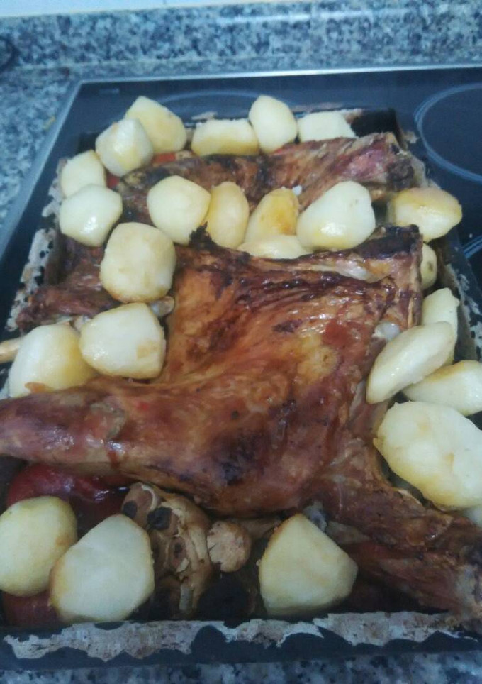 Una foto de Cordero lechal asado