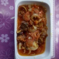 A picture of Gravy with diced beef.