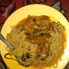 A picture of Indomie and chicken.