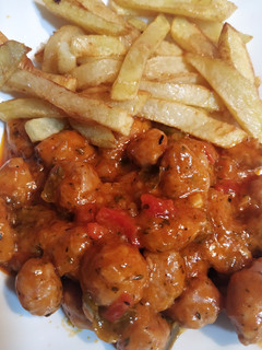 Una foto de Salchichas con tomate