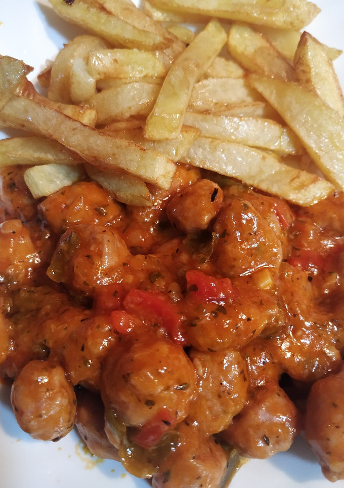 Una foto de Salchichas con tomate
