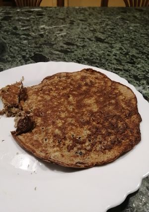 Una foto de Panqueque de chocolate, Avena, Banana y Arándanos! Una delicia