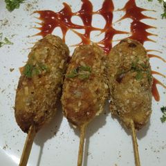 Paneer potato lollipop A picture of Paneer potato lollipop.