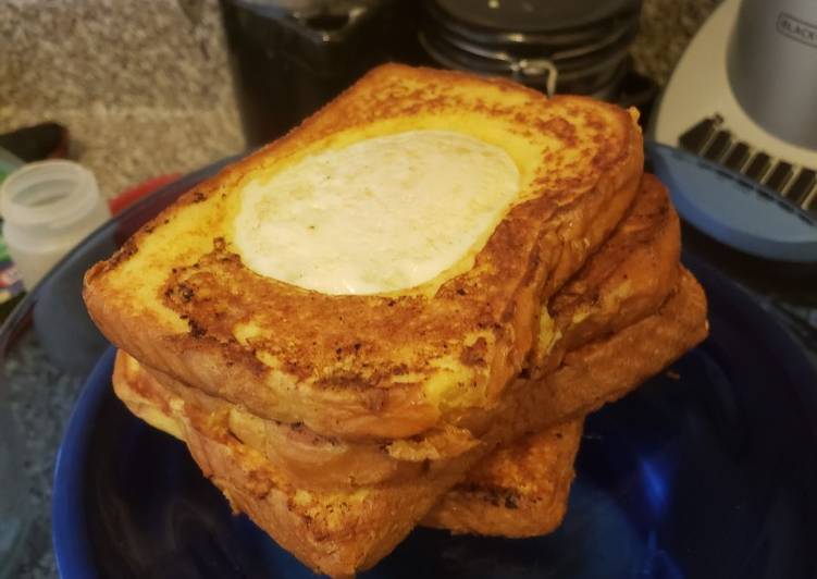 Steps to Make Tasty Egg-In-A-Hole French Toast
