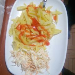 A picture of Homemade chips and coleslaw salad.