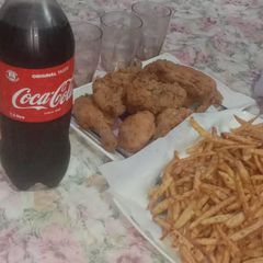A picture of Chicken fry with fries.