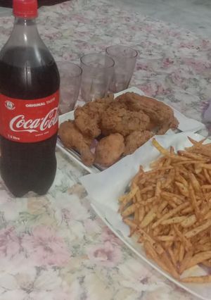 A picture of Chicken fry with fries.