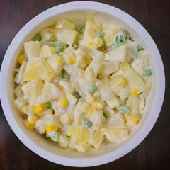 A picture of Creamy potato corn and pea salad.