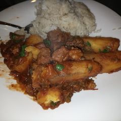 A picture of Matoke and beef.