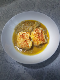Una foto de Bacalao encebollado