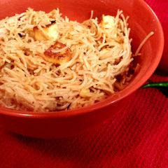 A picture of Tomato sweetcorn semiya with paneer.