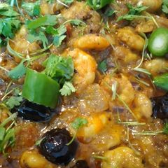 A picture of Achari prawn masala.