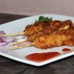 A picture of Spicy chicken boti sticks.
