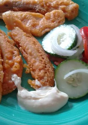 Una foto de Pescado frito, tipo mercado sobre ruedas. ॐ
