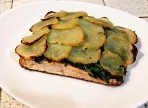 Foto di Filetto di salmone in crosta di patate con erbe di campagna