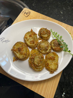 Una foto de Milhojas de patata al horno