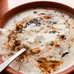 A picture of Mooli Raita with walnuts.