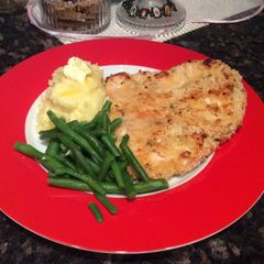 A picture of Chicken schitty w/garlic mash + beans.