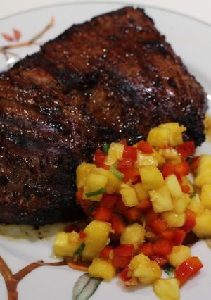 A picture of Asian-Spiced Flank Steak with Pineapple-Pepper Salsa.