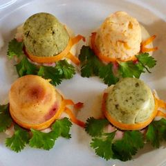 A picture of Healthy vegetable idlis in hat and cup shape !.