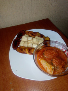A picture of Fried Cubed yam,Dodo and Stew.