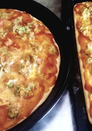 Una foto de Pizzas + hamburguesas con la misma masa