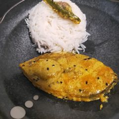 Hilsa curry in mustard paste A picture of Hilsa curry in mustard paste.
