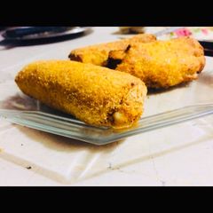 A picture of Chicken Cheese bread roll.