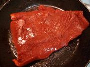 Una foto de cecina asada