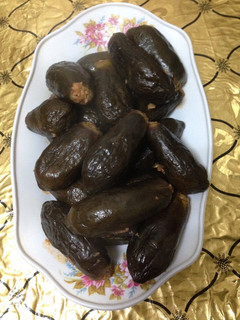 صورة لوصفة محشي باذنجان برب البندوره روووعه بشهي