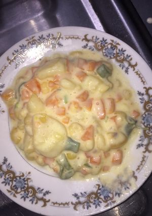 Una foto de Puré de vegetales en salsa blanca