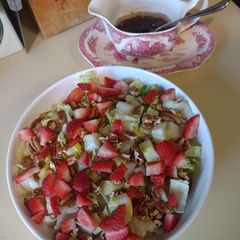 A picture of Strawberry pecan salad with balsamic vinaigrette.