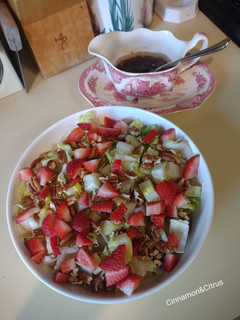 A picture of Strawberry pecan salad with balsamic vinaigrette.