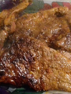 Una foto de Bistec de ternera en adobo rojo